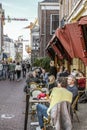 Street view and people eating, drinking outdoor in Utrecht, Netherlands Royalty Free Stock Photo