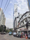 Street view of Silom area in Bangkok with King Power MahaNakhon in background