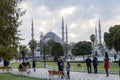 Street view from Sultanahmet Square. Foreign and local tourists coming to see the Blue Mosque Sultanahmet Camii and Square.