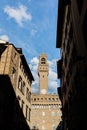 Street view of the Tower of the Palazzo Vecchio in Florence Royalty Free Stock Photo