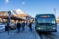 Street view of Town of Banff. Bus stop on Banff Avenue in winter snowy season.