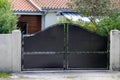 Street vintage home grey dark door in metal retro house gate to garden access