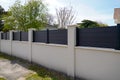 Street wall modern barrier around the house protection garden access home Royalty Free Stock Photo