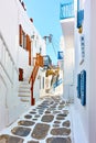 Street with whitewashed houses in Mykonos