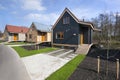 Street with wooden vacation houses in Reeuwijk Royalty Free Stock Photo