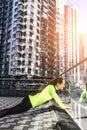 Woman in sportswear is doing workout outdoors Royalty Free Stock Photo