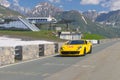 In the street a yellow Ferrari take part in the CAVALCADE 2018 event along the roads of Italy, France and Switzerland around MONTE