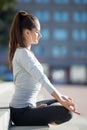 Street yoga: Half Lotus Pose Royalty Free Stock Photo