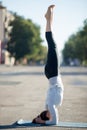 Street yoga: salamba sirsasana pose Royalty Free Stock Photo