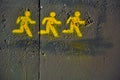Streetart, three running yellow man picto Royalty Free Stock Photo