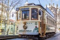 Streetcar in front of a church in Porto