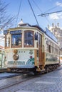 Streetcar in front of a church in Porto