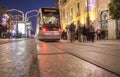 Streetcar that runs along downtown at night with Christmas decor Royalty Free Stock Photo