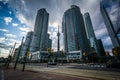 Streetcar tracks and modern buildings along Queens Quay West, at