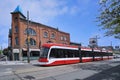 trams running on tracks embedded in the road are a common form of public transit in the older parts of downtown Toronto Royalty Free Stock Photo