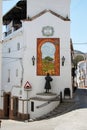 Streetcorner with statue, Alora.