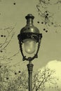 Streetlamp in Paris with old postcard effect Royalty Free Stock Photo