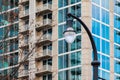 Streetlight on the background of skyscraper Royalty Free Stock Photo