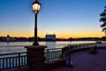 Streetlight, balcony and panoramic view of dockside on sunset background at Lake Buena Vista area.