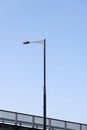 low angle view of a streetlight on the bridge Royalty Free Stock Photo