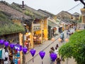 The streets of ancient town of Hoi An in central Vietnam, old houses and lanterns of various colors, busy streets full of people Royalty Free Stock Photo