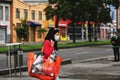 Woman on the streets of colombia with face masks and market bag Royalty Free Stock Photo