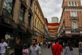 Streets of the capital of Sarajevo, view of city buildings, cafes, restaurants and shops, people walk around the city. Sights of