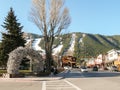 Streets of Jackson Hole with ski slopes at background