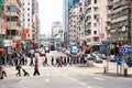 Streets in Kowloon, Hong Kong. Local inhabitants and tourists in streets of Kowloon