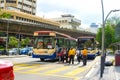 The streets of Kuala Lumpur during quarantine. People are trying to network on a bus. People are allowed into public transport Royalty Free Stock Photo