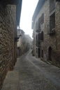 Streets Of The Medieval Village Of Ainsa In A Day Of Mild Fog. Travel, Landscapes, Architecture. December 26, 2014. Ainsa, Huesca Royalty Free Stock Photo