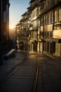 Streets of the old city in the rays of a stunning dawn. Porto