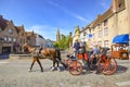 Streets of old medieval city of Bruge with horse carriage, Belgium