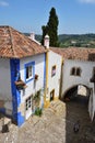 In the streets of the picturesque town of Obidos, Portugal Royalty Free Stock Photo