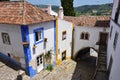 In the streets of the picturesque town of Obidos, Portugal Royalty Free Stock Photo