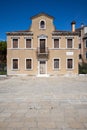 Streets of post Covid Venice with an empty abandoned house.