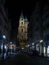 Streets of Prague Czech Republic at night with Saint Nicholas Church in the background Royalty Free Stock Photo