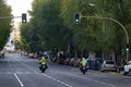 Streets, roads and highways of Madrid empty of cars while some people walk with the traffic lights on, in Spain. Europe.