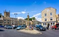 Streets and shops and market cross in historic cotswold town of Stow on the Wold