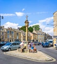 Streets and shops and market cross in historic cotswold town of Stow on the Wold