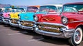 Streets strewn with asphalt, along which ancient cars with characteristic chrome details and roun Royalty Free Stock Photo