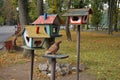 Birdhouses in the autumn central city park of Vinnitsa