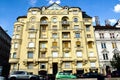 Streetscape with decorative old apartment building facade in Budapest. blue sky Royalty Free Stock Photo