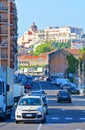 Streetscene of Cagliari, with cars and a view on the Castello; the Castle of Cagliari