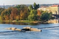 Strelecky Island with weir on Vltava river near National Theatre and the Charles Bridge, Prague, Czech Republic, sunny day Royalty Free Stock Photo