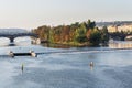 Strelecky Island with weir on Vltava river near National Theatre and the Charles Bridge, Prague, Czech Republic, sunny day Royalty Free Stock Photo