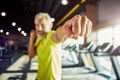 Strength training. Focused mature man in sportswear boxing, while working out at gym, focus on male hand Royalty Free Stock Photo