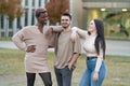 The Strength of Youth Diversity. Three young people smiling Royalty Free Stock Photo