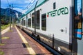 STRESA, ITALY - JULY 14, 2016. Stresa railway station and arriving train Trenord Italia.