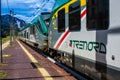 STRESA, ITALY - JULY 14, 2016. Stresa railway station and arriving train Trenord Italia.